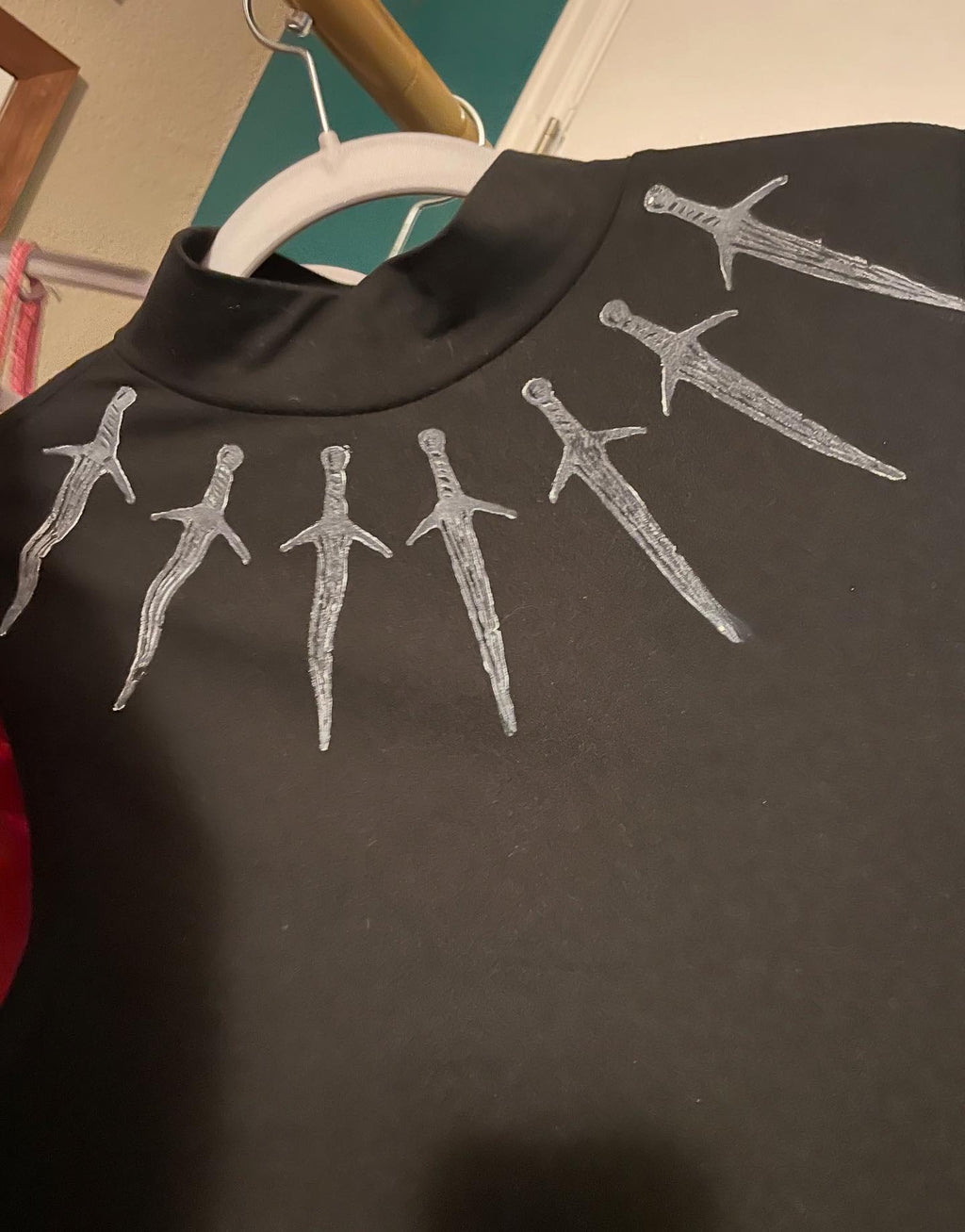 Black Dagger Collar Sleeveless Mockneck