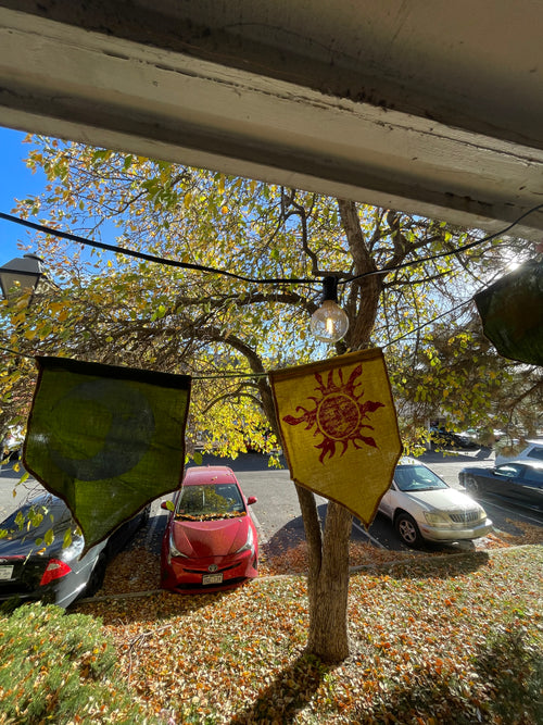 5-flag whimsigoth sun and moon bunting garland, green, yellow, orange, and gold