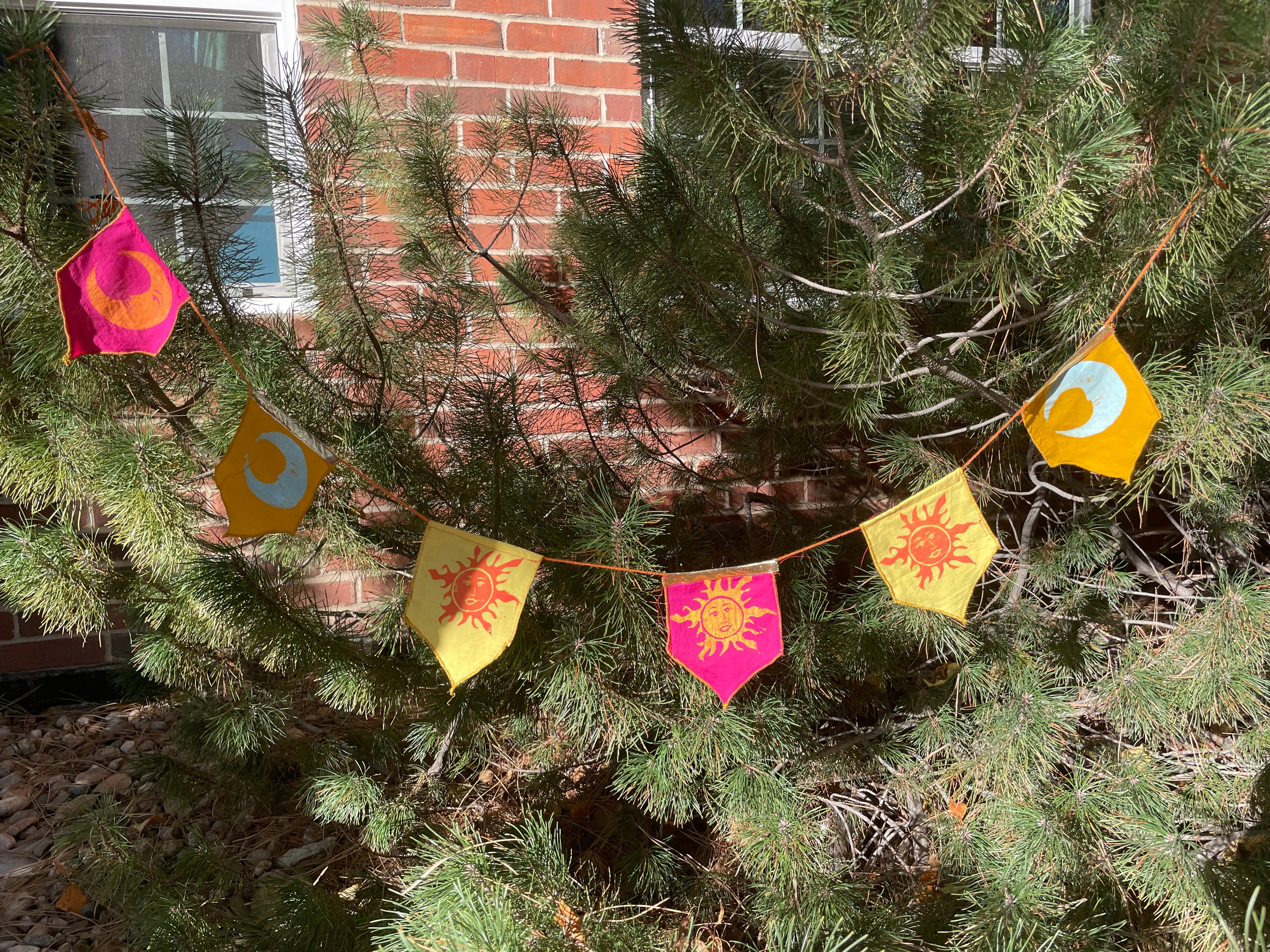 6-flag whimsigoth sun and moon bunting garland, pink, yellow, orange, and gold